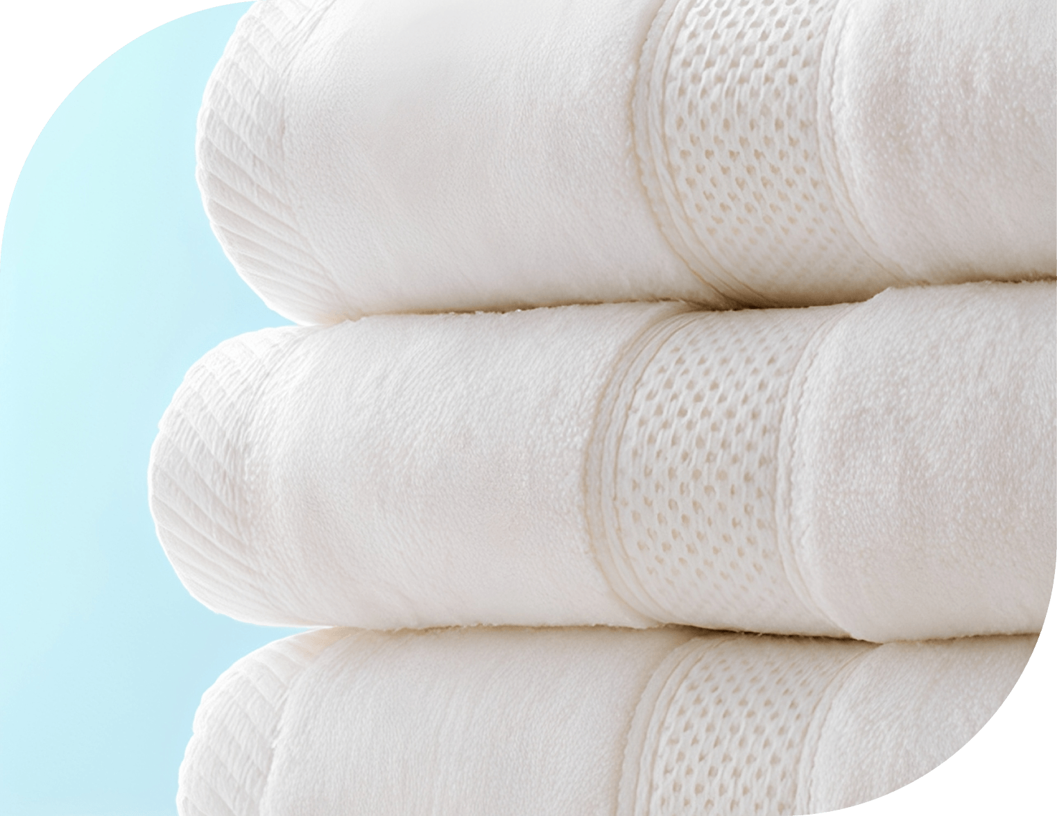 Three neatly folded white towels.